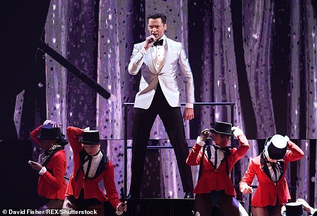 Is there anything he can't do! It's just days until Hugh kicks off his world tour, which was inspired by his performance in The Greatest Showman, with multiple dates in Glasgow in early May. The star is pictured performing at the Brit Awards in February