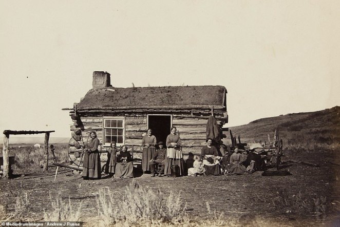 The Union Pacific Railroad commissioned Andrew J. Russell to take this series of photographs to document the successful development of the track - but he often captured a complex picture of western expansion. This striking shot shows a Mormon family living in the Great Salt Lake Valley. Russell used the collodion photographic process to capture such emotive portraits in remote locations